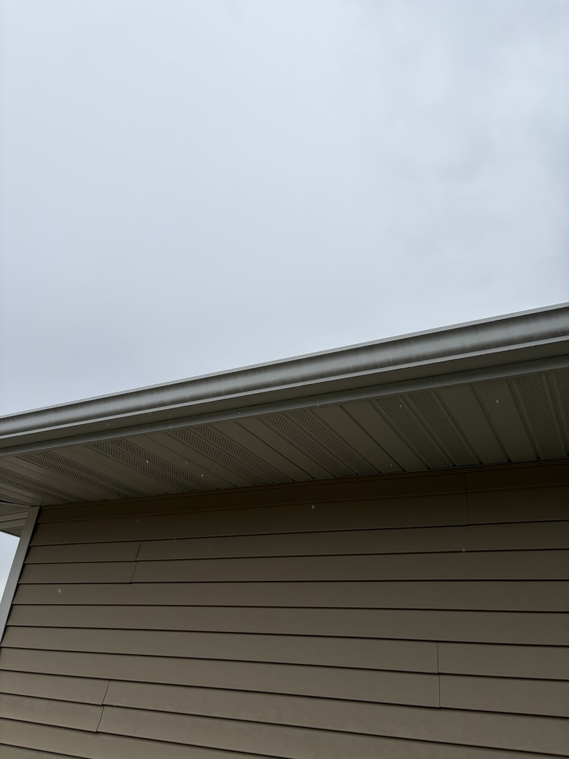 Clean gutter run on side of home