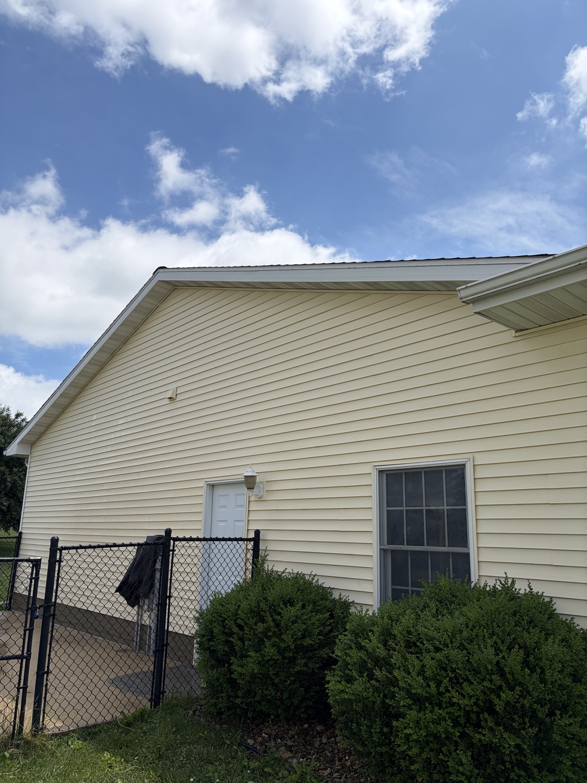 Side of home before soft washing