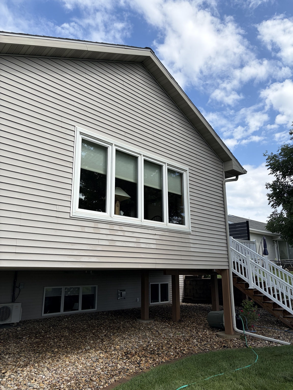 Row of cleaned upper-level windows on a home